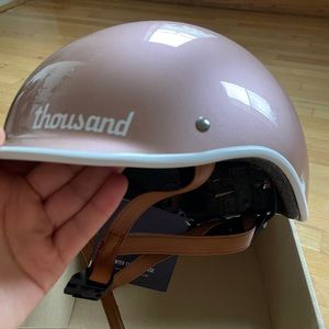 Brand new Thousand rose gold helmet